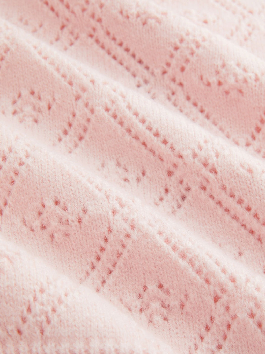 Jersey de punto rosa de hombro al descubierto