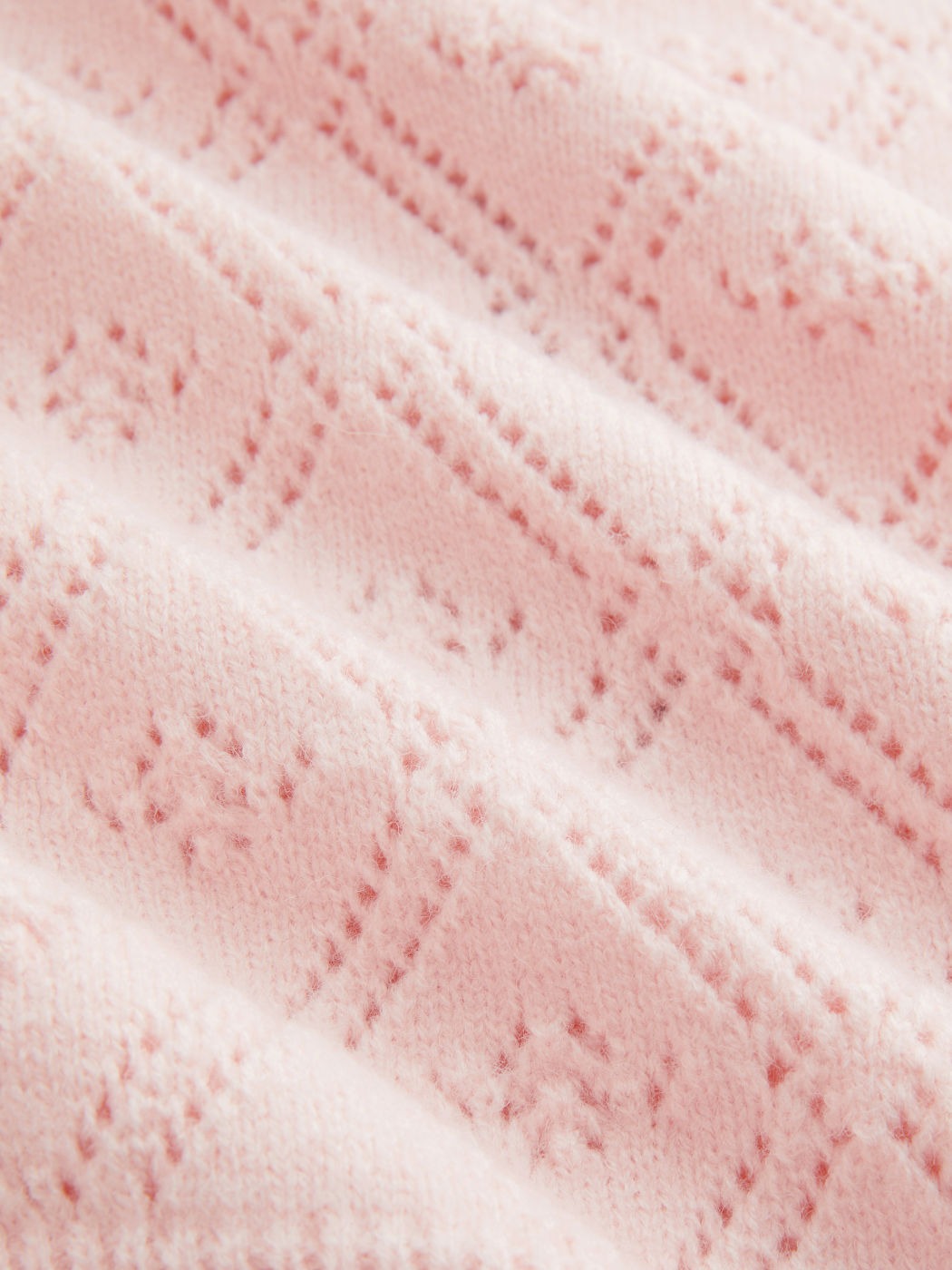 Jersey de punto rosa de hombro al descubierto